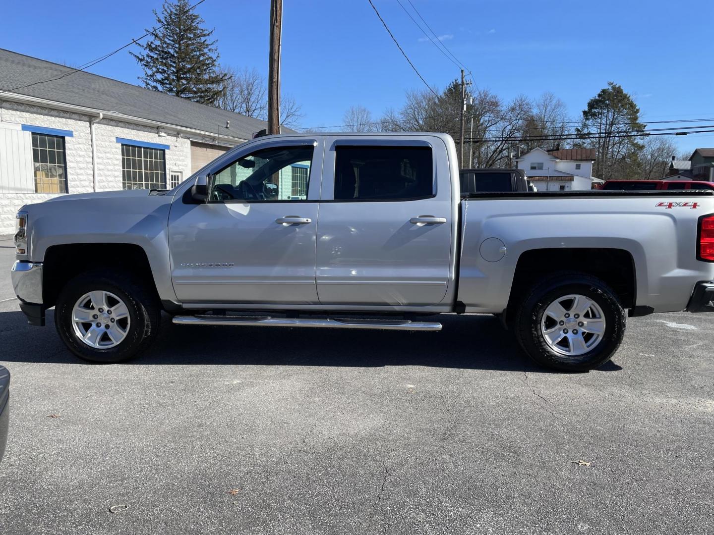 2017 silver Chevrolet Silverado 1500 LT Crew Cab 4WD (3GCUKREC1HG) with an 5.3L V8 OHV 16V Brand New Engine Less than 500 miles engine, 6A transmission, located at 101 N. Main Street, Muncy, PA, 17756, (570) 546-5462, 41.207691, -76.785942 - Photo#5