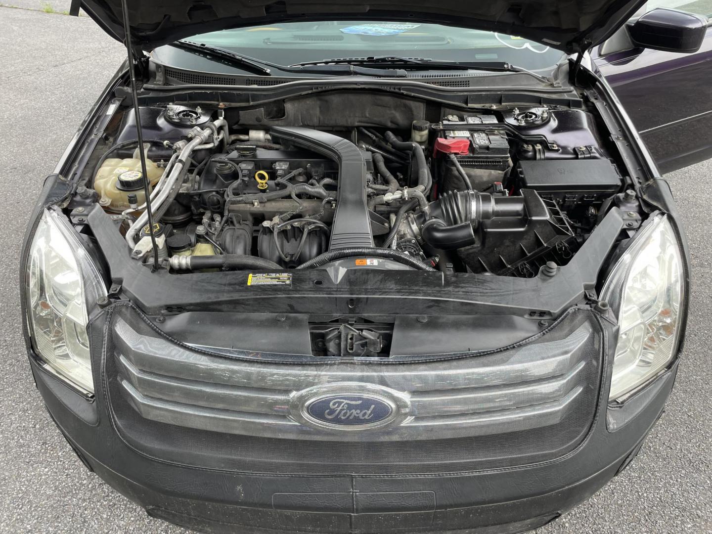 2007 Plum Ford Fusion SE (3FAHP07Z17R) with an 2.3L L4 DOHC 16V engine, auto transmission, located at 101 N. Main Street, Muncy, PA, 17756, (570) 546-5462, 41.207691, -76.785942 - Photo#7