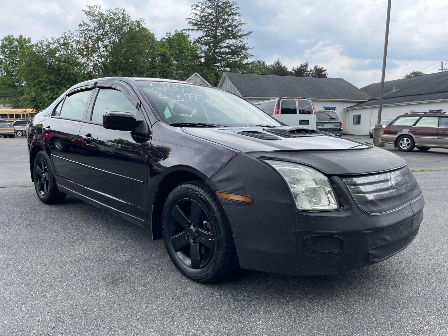 2007 Plum Ford Fusion SE (3FAHP07Z17R) with an 2.3L L4 DOHC 16V engine, auto transmission, located at 101 N. Main Street, Muncy, PA, 17756, (570) 546-5462, 41.207691, -76.785942 - Photo#1