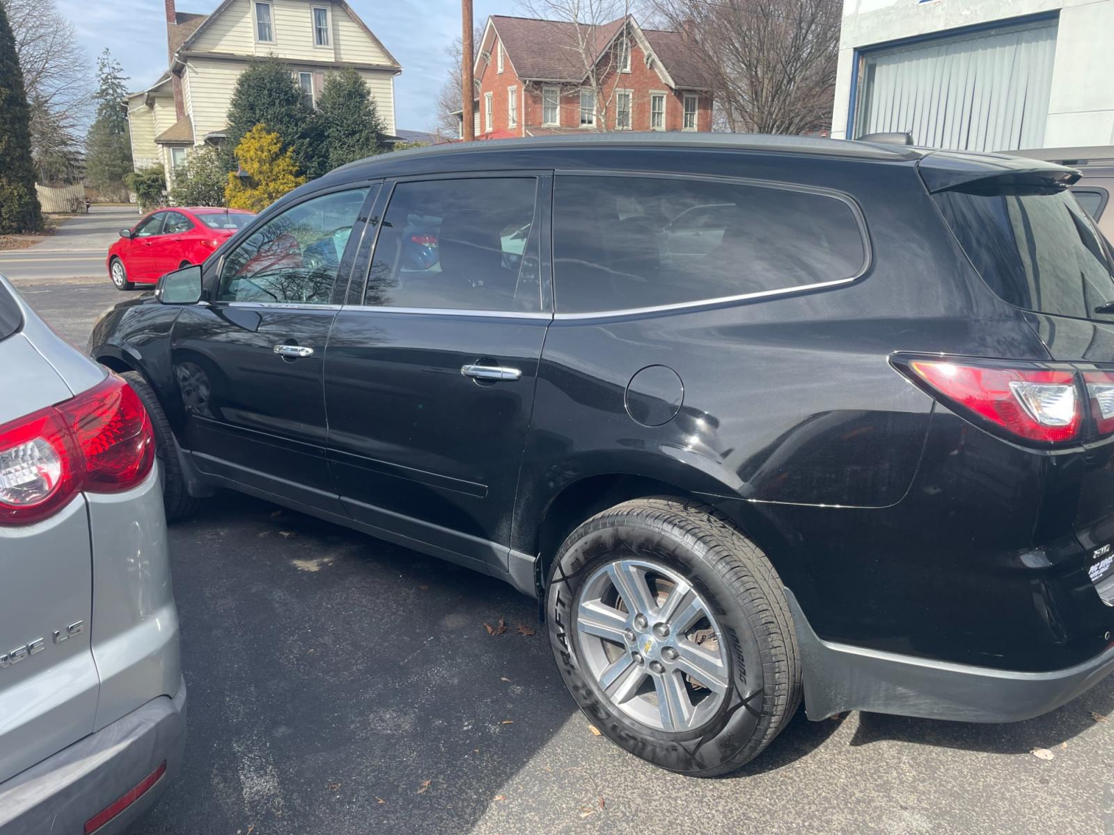 2016 black Chevrolet Traverse 2LT AWD (1GNKVHKD9GJ) with an 3.6L V6 DOHC 24V engine, 6-Speed Automatic transmission, located at 101 N. Main Street, Muncy, PA, 17756, (570) 546-5462, 41.207691, -76.785942 - Photo #3