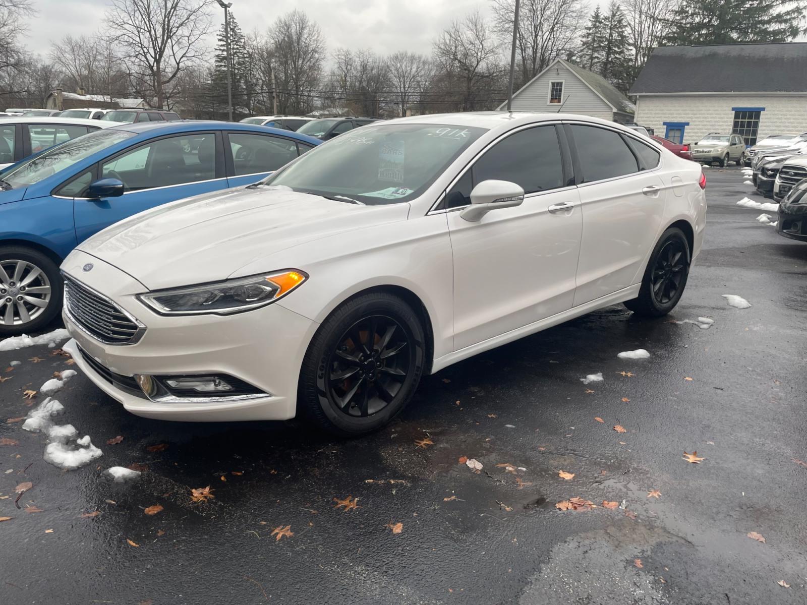 2017 White Ford Fusion SE (3FA6P0HD4HR) with an 1.5L L4 DOHC 16V engine, 6A transmission, located at 101 N. Main Street, Muncy, PA, 17756, (570) 546-5462, 41.207691, -76.785942 - Photo #0