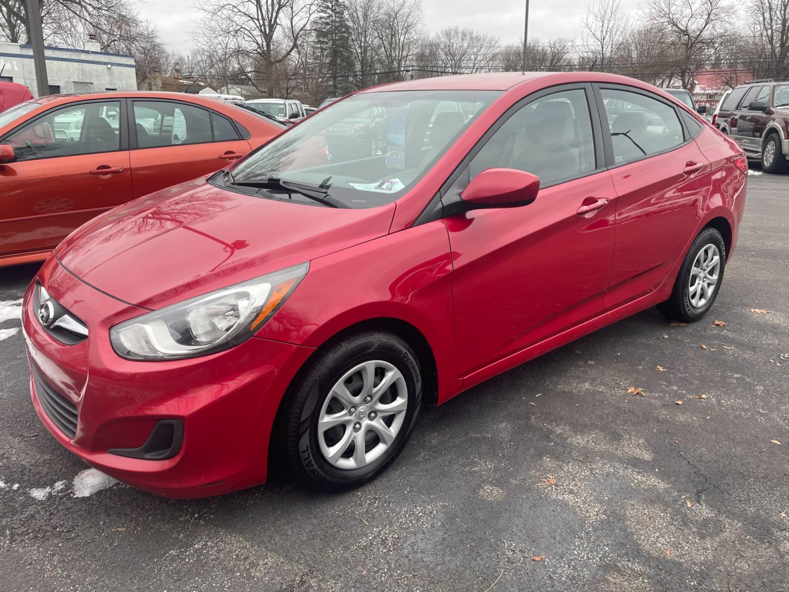 2014 Red Hyundai Accent GLS 4-Door (KMHCT4AE5E4) with an 1.6L L4 DOHC 16V engine, located at 101 N. Main Street, Muncy, PA, 17756, (570) 546-5462, 41.207691, -76.785942 - Photo #0