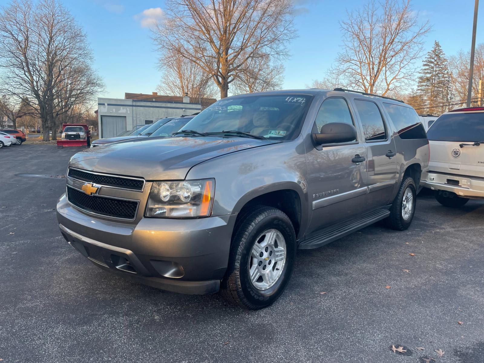 2007 grey Chevrolet Suburban LS 1500 4WD (3GNFK16367G) with an 5.3L V8 OHV 16V FFV engine, 4-Speed Automatic Overdrive transmission, located at 101 N. Main Street, Muncy, PA, 17756, (570) 546-5462, 41.207691, -76.785942 - Photo #0
