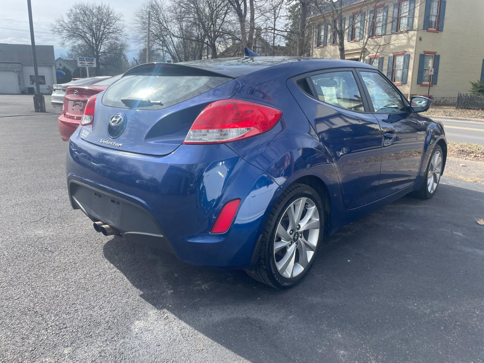 2016 blue Hyundai Veloster Base 6MT (KMHTC6AD9GU) with an 1.6L L4 DOHC 16V engine, 6-Speed Manual transmission, located at 101 N. Main Street, Muncy, PA, 17756, (570) 546-5462, 41.207691, -76.785942 - Photo #3