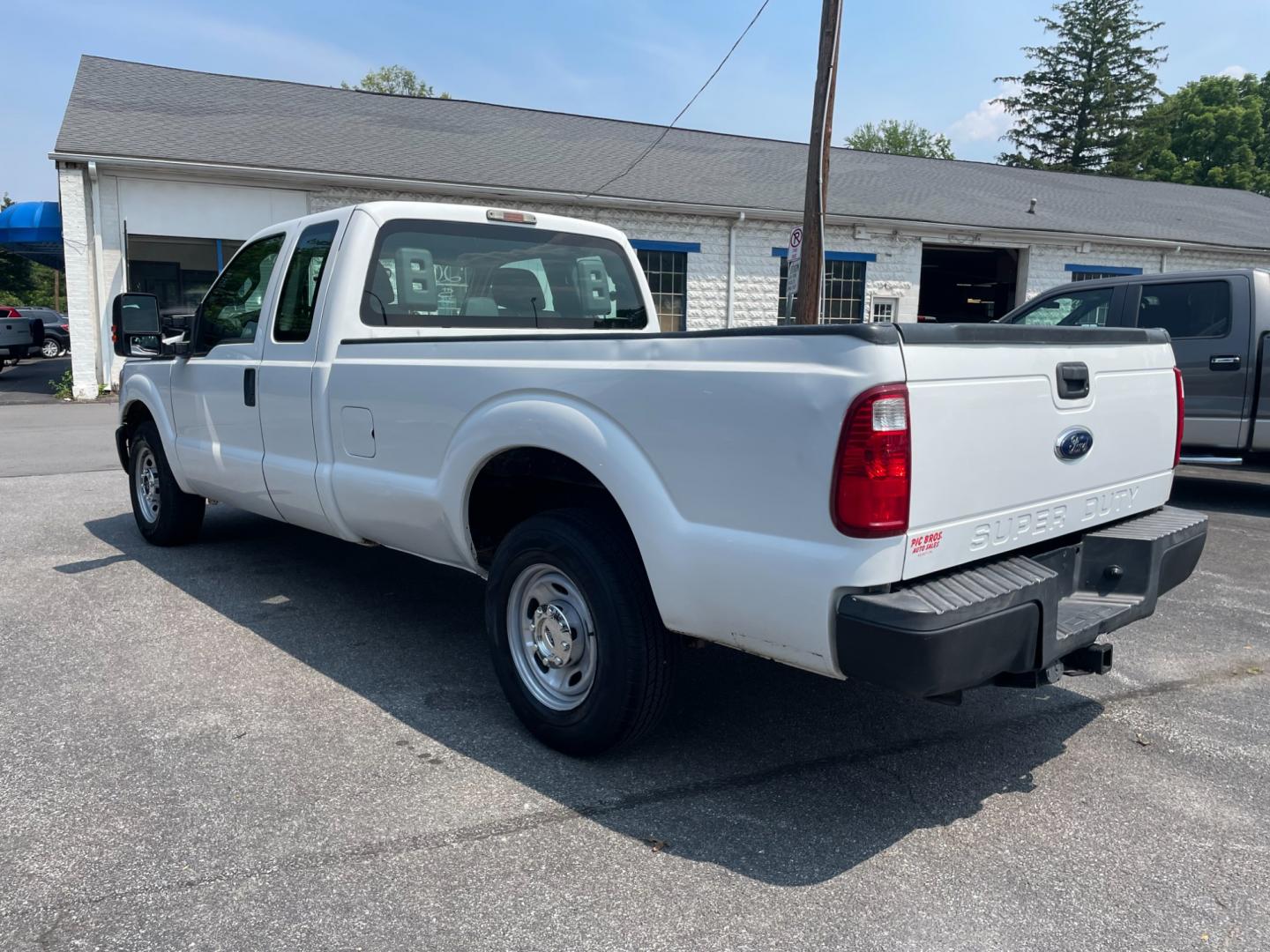 2012 White Ford F-250 SD Lariat SuperCab 2WD (1FT7X2A67CE) with an 6.2L V8 OHV 16V engine, 6-Speed Automatic transmission, located at 101 N. Main Street, Muncy, PA, 17756, (570) 546-5462, 41.207691, -76.785942 - Photo#2