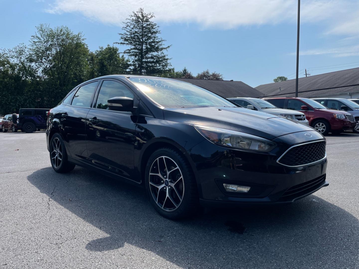 2018 black Ford Focus SEL Sedan (1FADP3H29JL) with an 2.0L L4 DOHC 16V engine, located at 101 N. Main Street, Muncy, PA, 17756, (570) 546-5462, 41.207691, -76.785942 - Photo#1