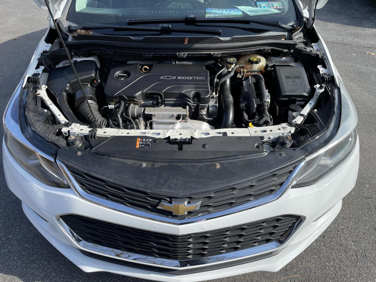 2017 White Chevrolet Cruze LT Auto (1G1BE5SM5H7) with an 1.4L L4 DOHC 16V TURBO engine, 6A transmission, located at 101 N. Main Street, Muncy, PA, 17756, (570) 546-5462, 41.207691, -76.785942 - Photo#7