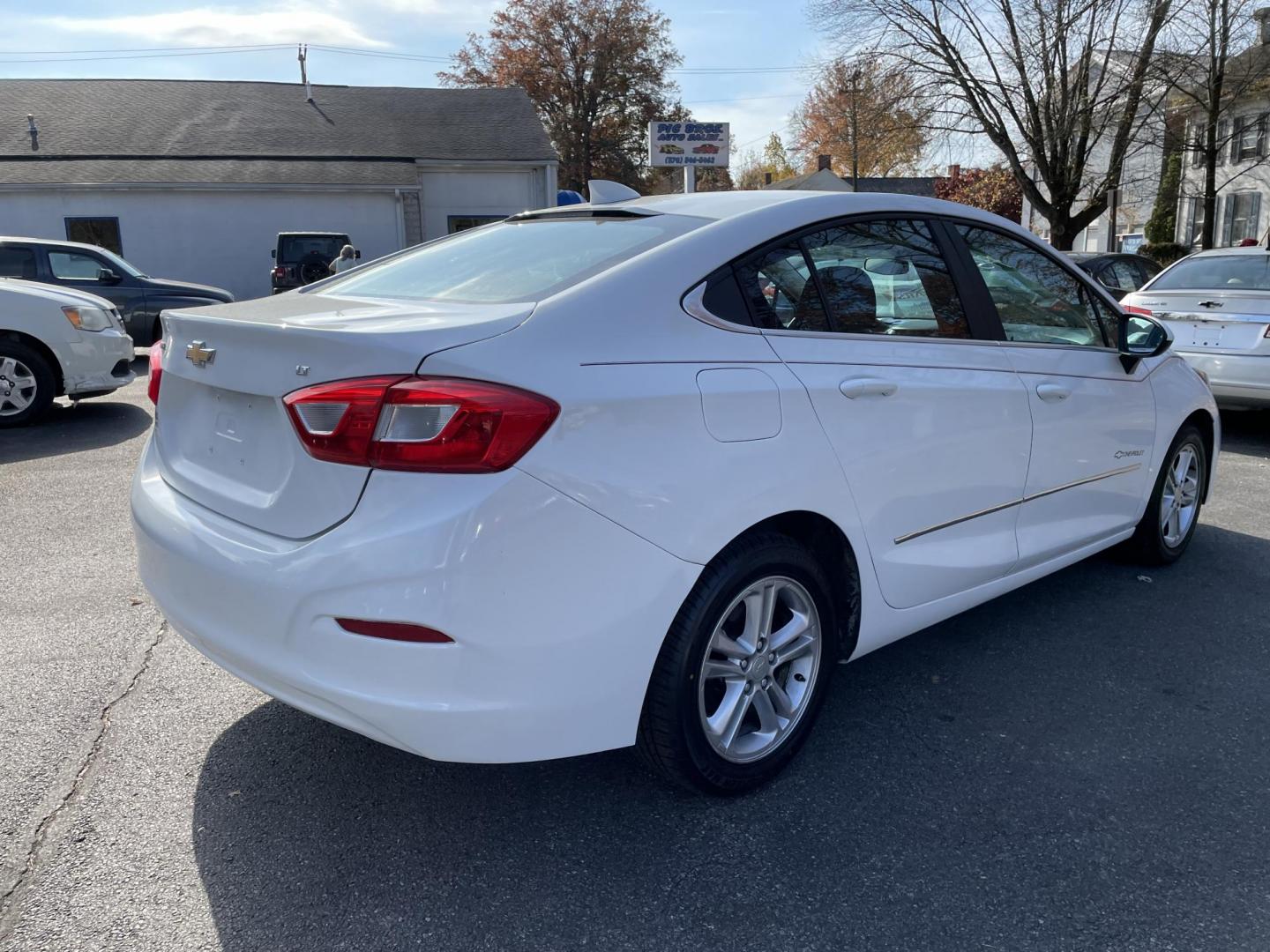 2017 White Chevrolet Cruze LT Auto (1G1BE5SM5H7) with an 1.4L L4 DOHC 16V TURBO engine, 6A transmission, located at 101 N. Main Street, Muncy, PA, 17756, (570) 546-5462, 41.207691, -76.785942 - Photo#2
