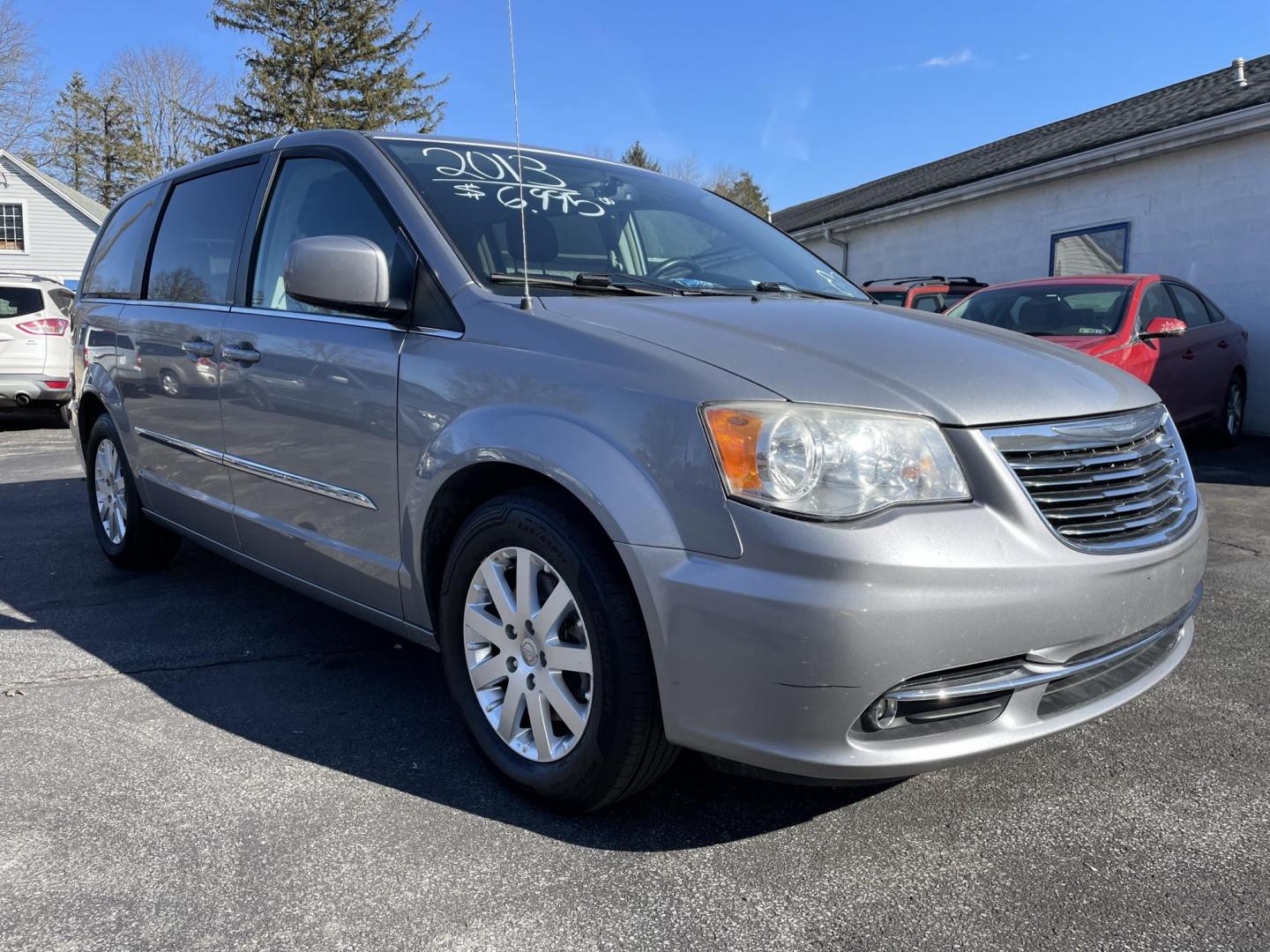 2013 silver Chrysler Town & Country Touring (2C4RC1BG6DR) with an 3.6L V6 DOHC 24V engine, 6-Speed Automatic transmission, located at 101 N. Main Street, Muncy, PA, 17756, (570) 546-5462, 41.207691, -76.785942 - Photo#1