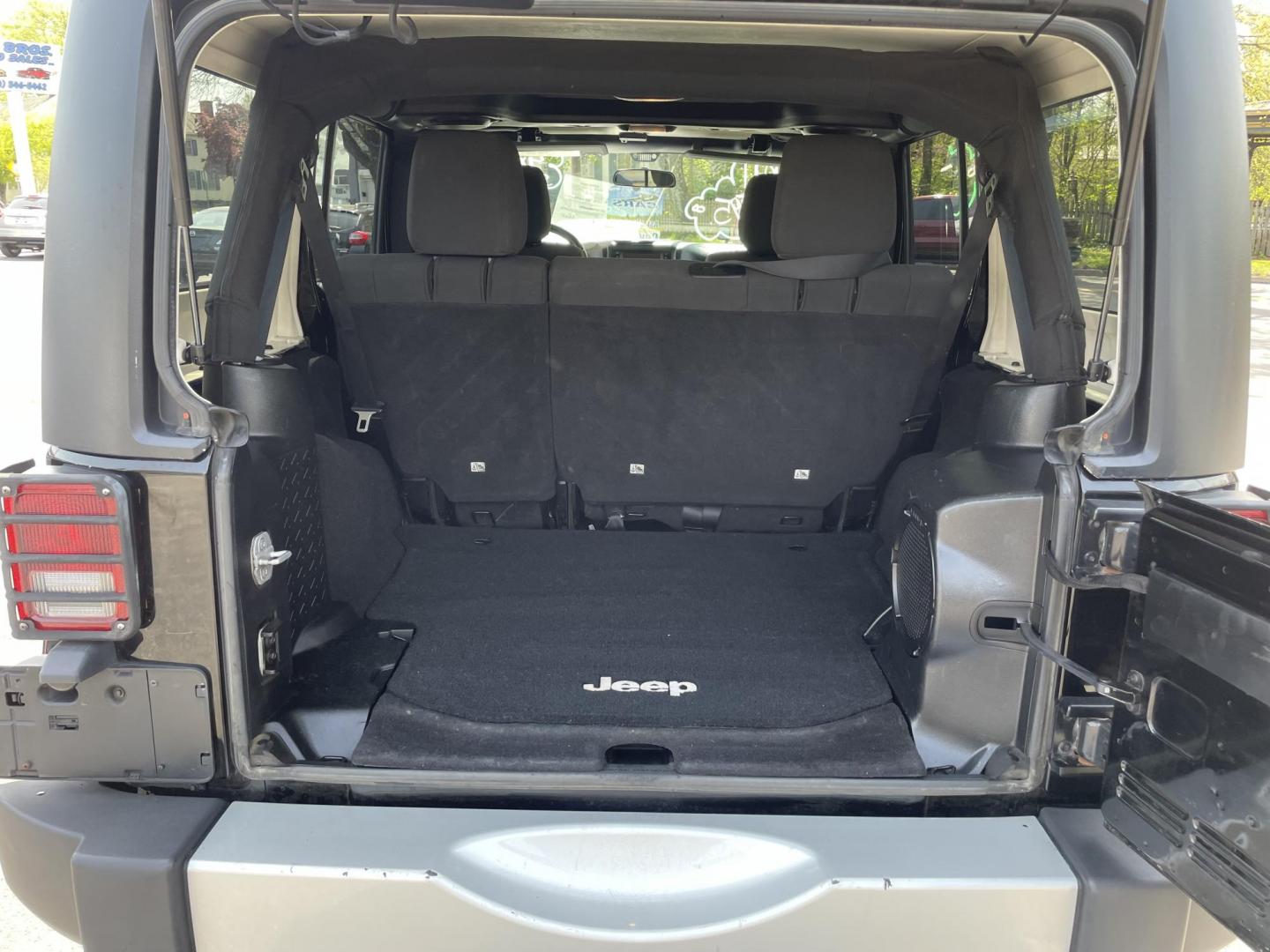 2011 black /black Jeep Wrangler Unlimited Sahara 4WD (1J4HA5H14BL) with an 3.8L V6 OHV 12V engine, located at 101 N. Main Street, Muncy, PA, 17756, (570) 546-5462, 41.207691, -76.785942 - Photo#9