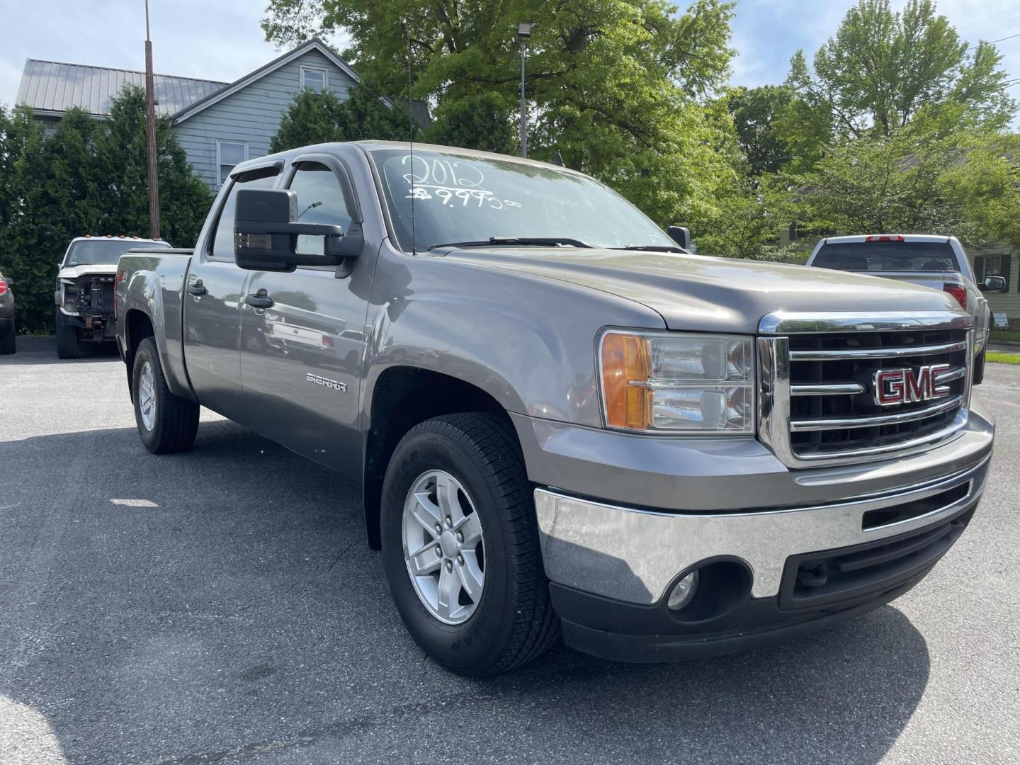 2012 GMC Sierra 1500 SLE Crew Cab 4WD (3GTP2VE79CG) with an 5.3L V8 OHV 16V FFV engine, 6-Speed Automatic transmission, located at 101 N. Main Street, Muncy, PA, 17756, (570) 546-5462, 41.207691, -76.785942 - Photo#1