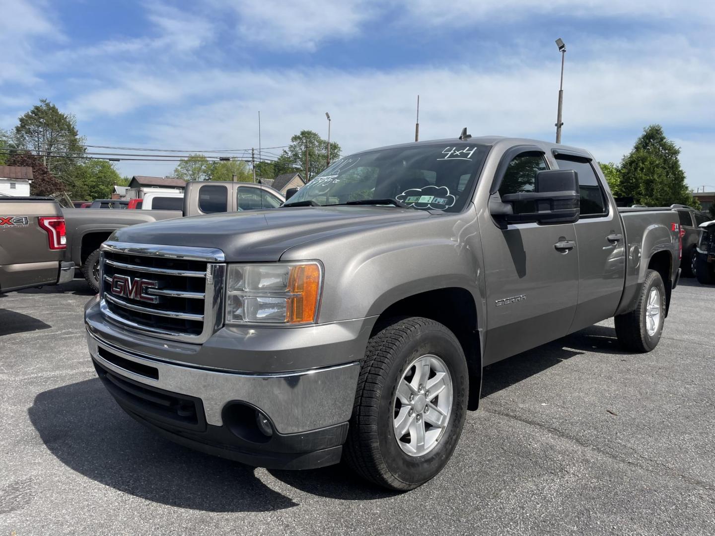 2012 GMC Sierra 1500 SLE Crew Cab 4WD (3GTP2VE79CG) with an 5.3L V8 OHV 16V FFV engine, 6-Speed Automatic transmission, located at 101 N. Main Street, Muncy, PA, 17756, (570) 546-5462, 41.207691, -76.785942 - Photo#0