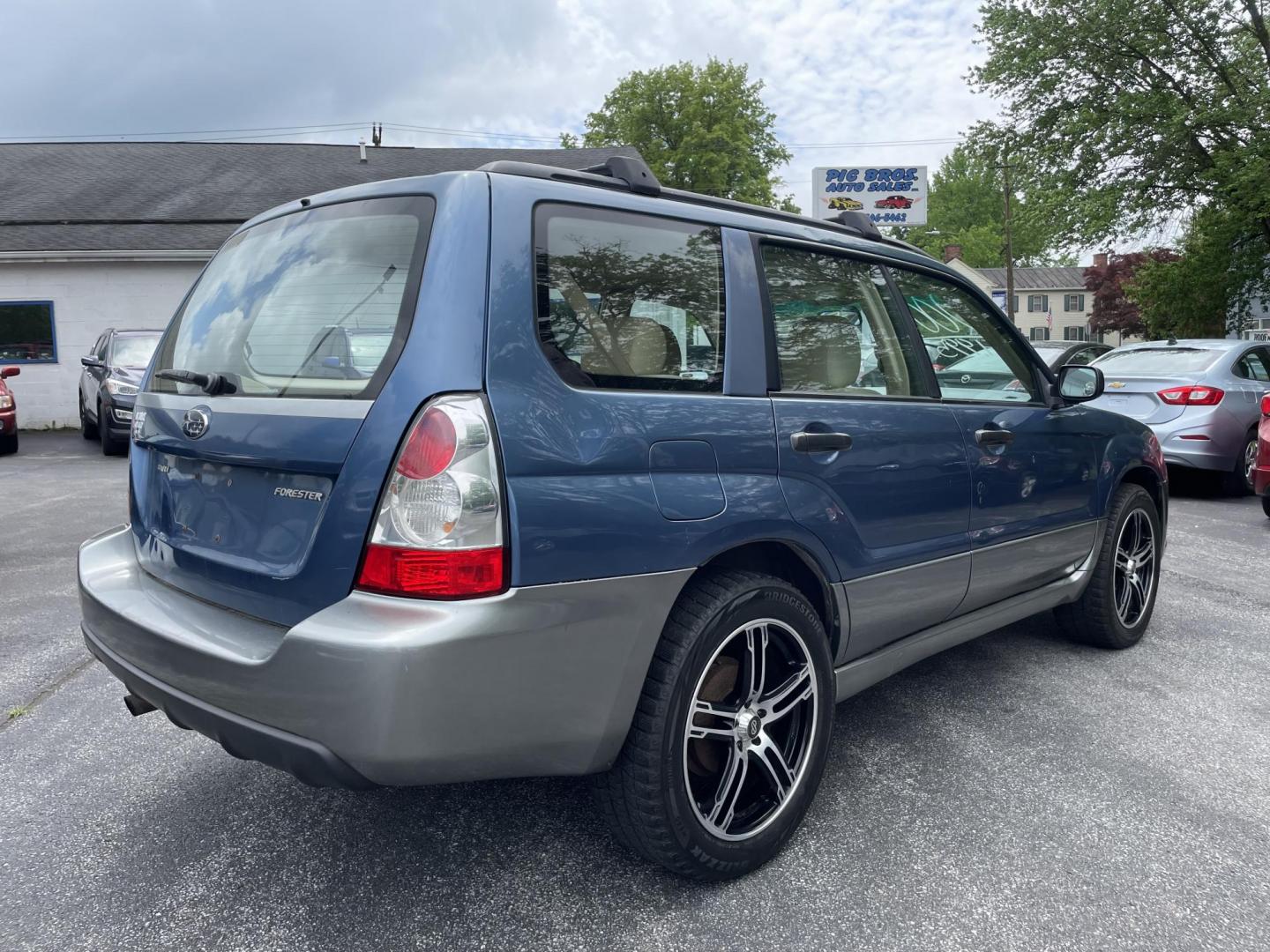 2007 blue Subaru Forester 2.5X (JF1SG63637G) with an 2.5L H4 SOHC 16V engine, 5 Speed Manual transmission, located at 101 N. Main Street, Muncy, PA, 17756, (570) 546-5462, 41.207691, -76.785942 - Photo#2