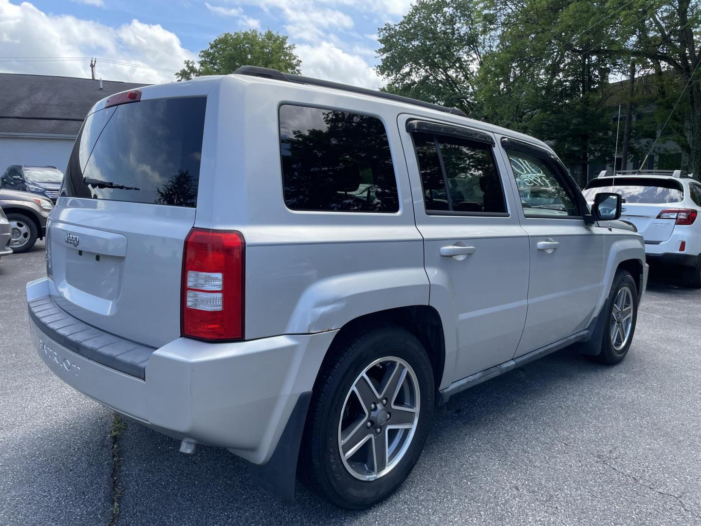 2010 silver /black Jeep Patriot Sport 4WD (1J4NF2GB6AD) with an 2.4L L4 DOHC 16V engine, located at 101 N. Main Street, Muncy, PA, 17756, (570) 546-5462, 41.207691, -76.785942 - Photo#3