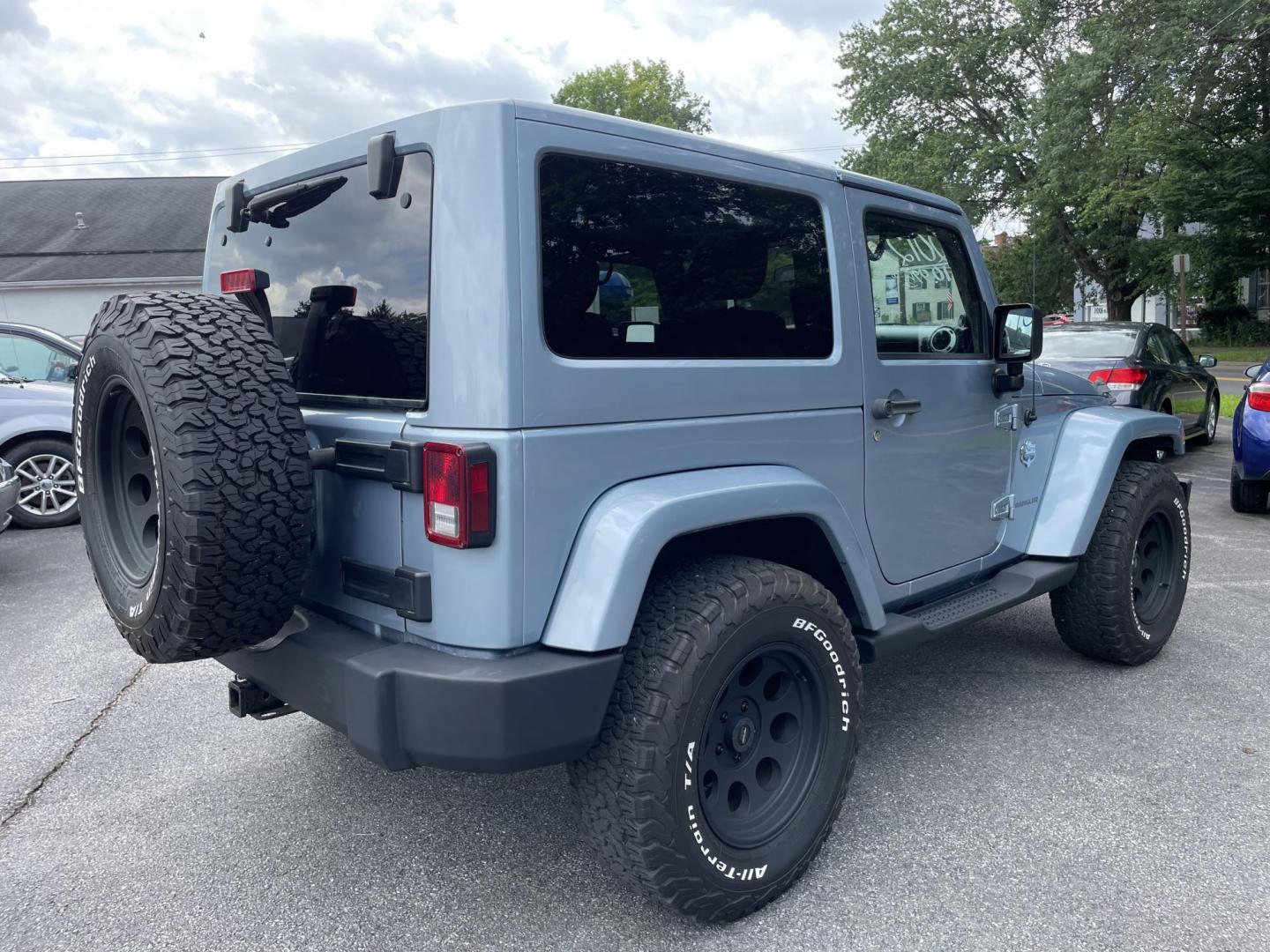 2012 blue /black Jeep Wrangler Sahara Arctic Edition 4WD (1C4AJWBG1CL) with an 3.6L V6 DOHC 24V FFV engine, Auto transmission, located at 101 N. Main Street, Muncy, PA, 17756, (570) 546-5462, 41.207691, -76.785942 - Photo#3