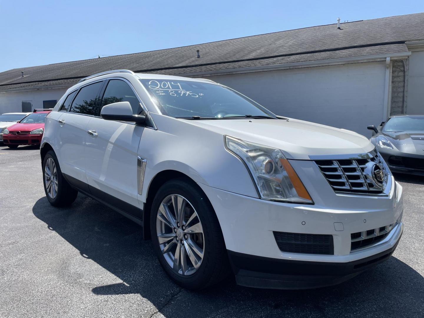 2014 White /black Cadillac SRX Luxury Collection AWD (3GYFNEE36ES) with an 3.6L V6 DOHC 24V FFV engine, 6-Speed Automatic transmission, located at 101 N. Main Street, Muncy, PA, 17756, (570) 546-5462, 41.207691, -76.785942 - Photo#1