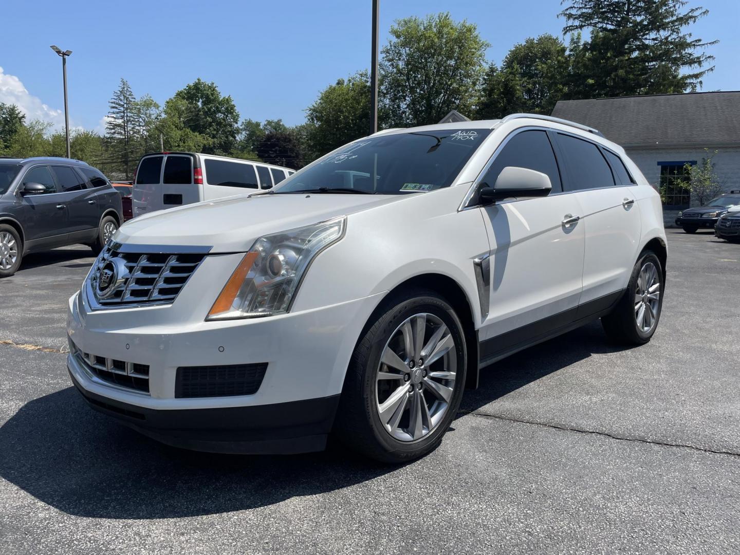 2014 White /black Cadillac SRX Luxury Collection AWD (3GYFNEE36ES) with an 3.6L V6 DOHC 24V FFV engine, 6-Speed Automatic transmission, located at 101 N. Main Street, Muncy, PA, 17756, (570) 546-5462, 41.207691, -76.785942 - Photo#0