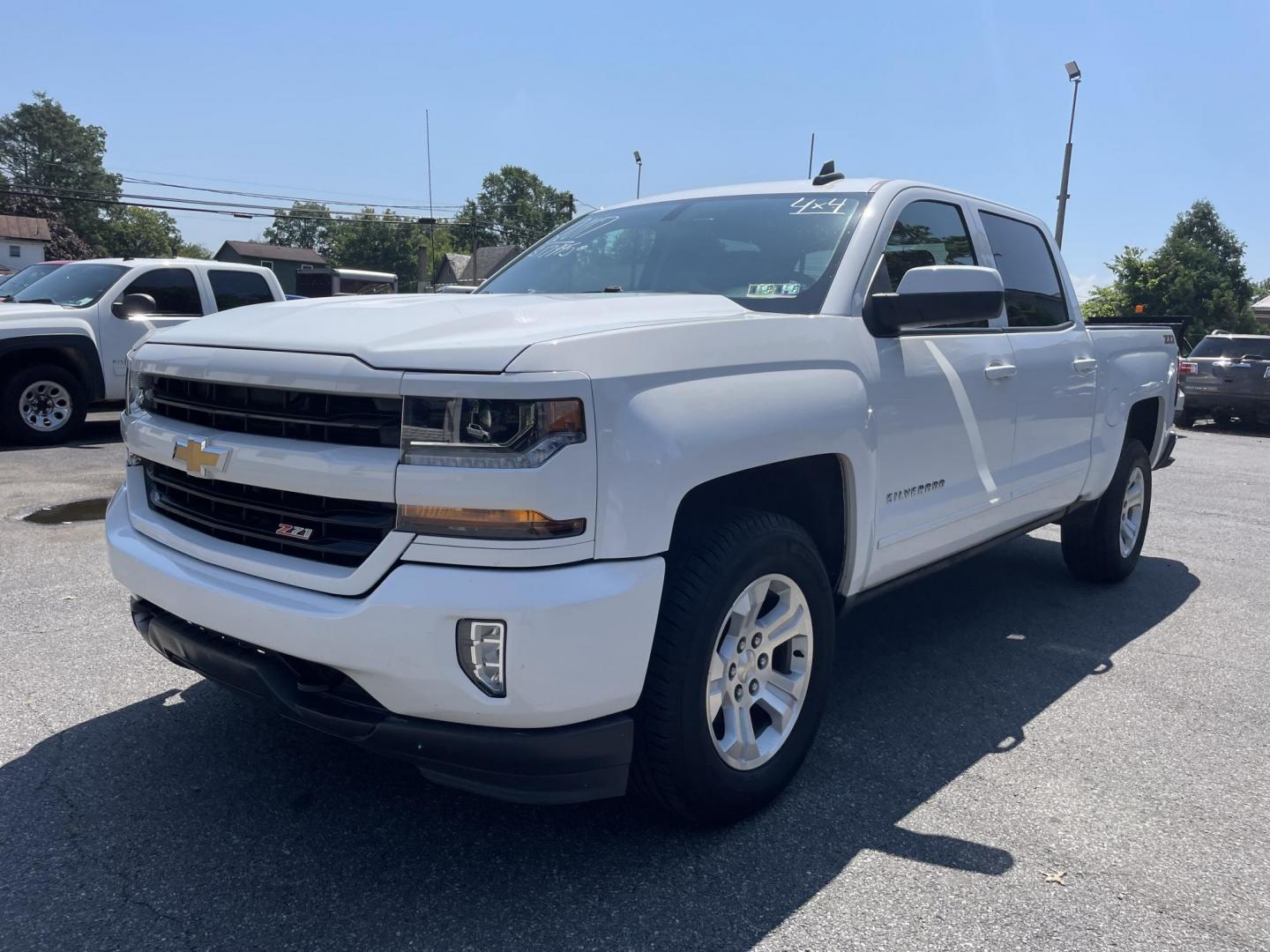 2017 White /black Chevrolet Silverado 1500 LT Crew Cab 4WD (3GCUKREC1HG) with an 5.3L V8 OHV 16V engine, 6A transmission, located at 101 N. Main Street, Muncy, PA, 17756, (570) 546-5462, 41.207691, -76.785942 - Photo#0