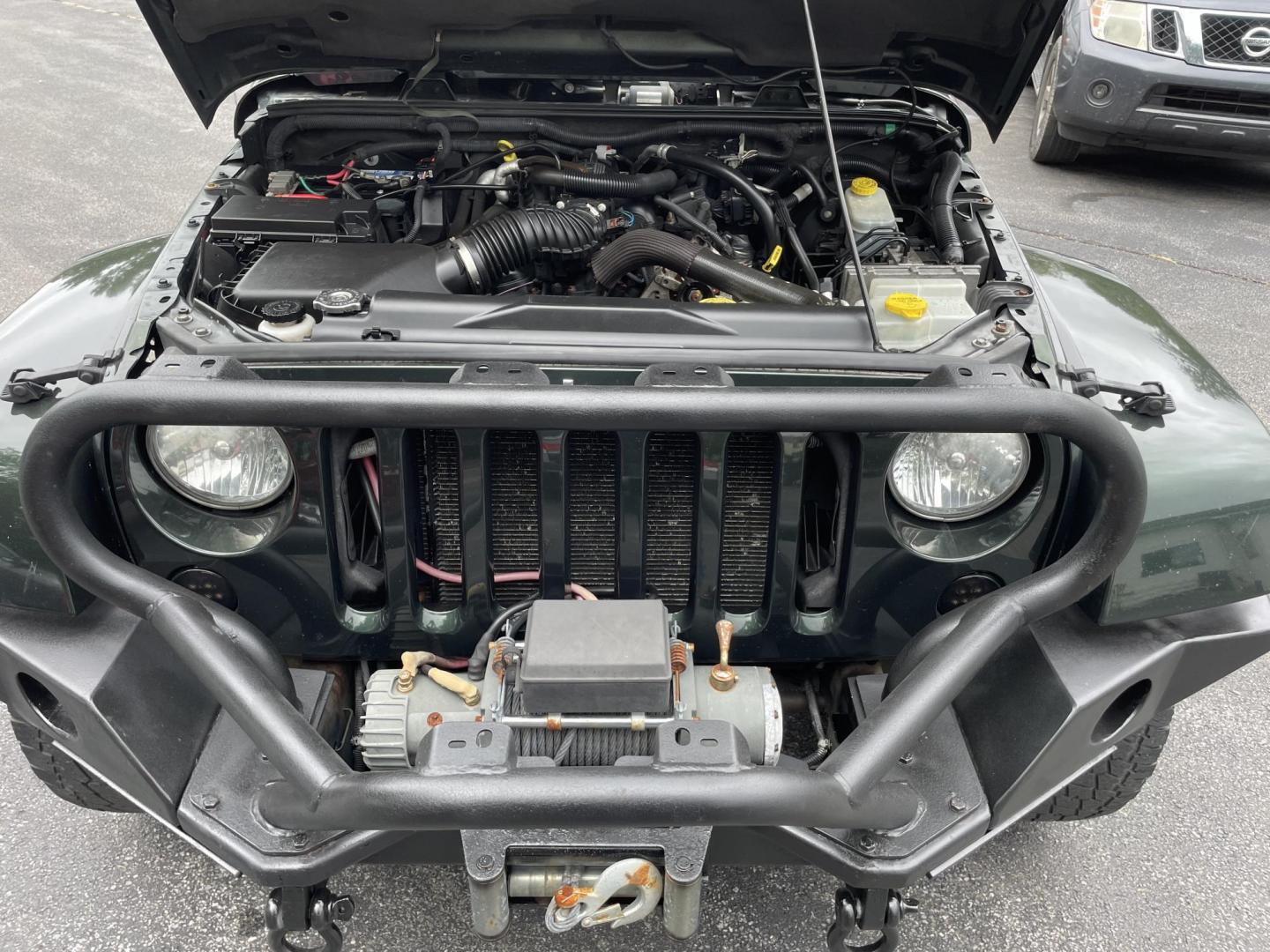 2010 Jeep Wrangler Sahara 4WD (1J4AA5D14AL) with an 3.8L V6 OHV 12V engine, located at 101 N. Main Street, Muncy, PA, 17756, (570) 546-5462, 41.207691, -76.785942 - Photo#7