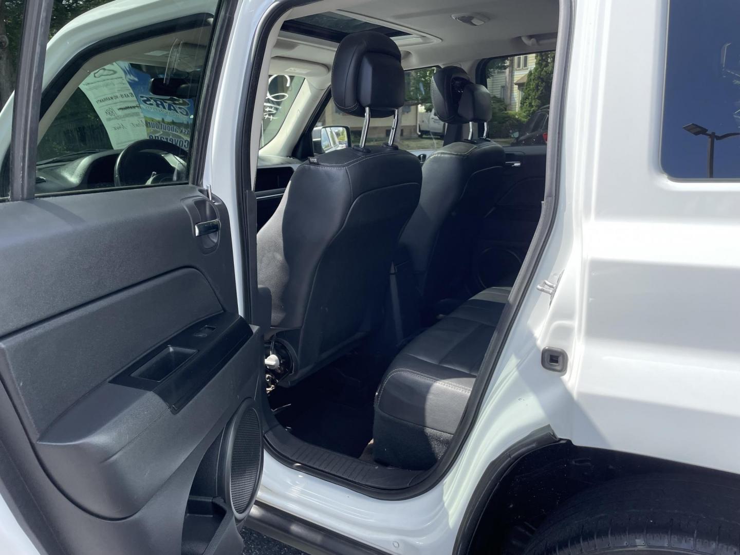 2015 White /black Jeep Patriot Latitude 4WD (1C4NJRFB4FD) with an 2.4L L4 DOHC 16V engine, auto transmission, located at 101 N. Main Street, Muncy, PA, 17756, (570) 546-5462, 41.207691, -76.785942 - Photo#5