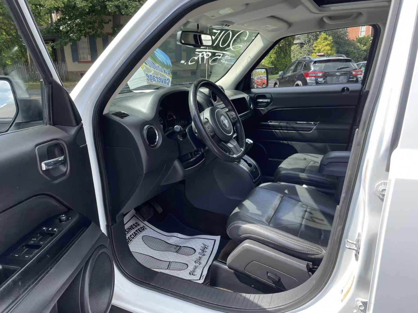 2015 White /black Jeep Patriot Latitude 4WD (1C4NJRFB4FD) with an 2.4L L4 DOHC 16V engine, auto transmission, located at 101 N. Main Street, Muncy, PA, 17756, (570) 546-5462, 41.207691, -76.785942 - Photo#4