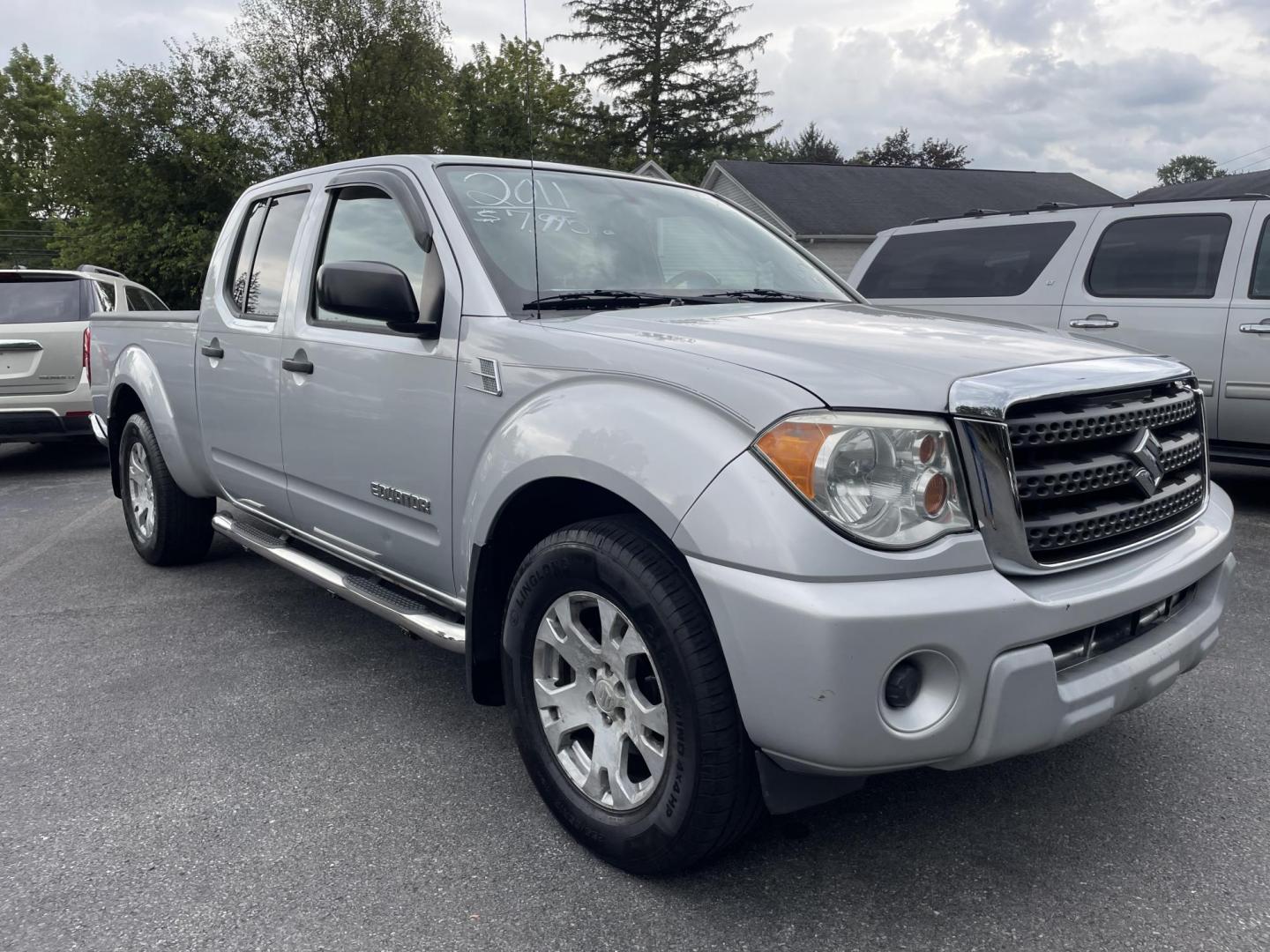 2011 silver Suzuki Equator Sport Crew Cab LWB 4WD (5Z61D0FV1BC) with an 4.0L V6 DOHC 24V engine, 5-Speed Automatic transmission, located at 101 N. Main Street, Muncy, PA, 17756, (570) 546-5462, 41.207691, -76.785942 - Photo#1