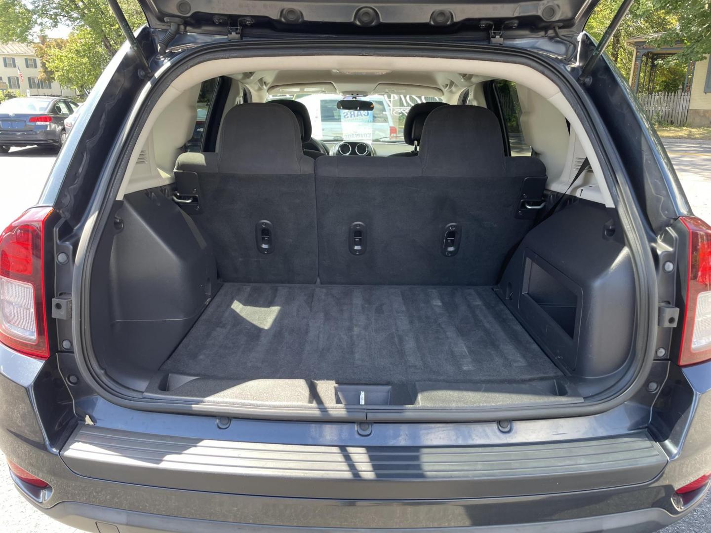 2014 Jeep Compass Sport 4WD (1C4NJDBB9ED) with an 2.4L L4 DOHC 16V engine, located at 101 N. Main Street, Muncy, PA, 17756, (570) 546-5462, 41.207691, -76.785942 - Photo#8