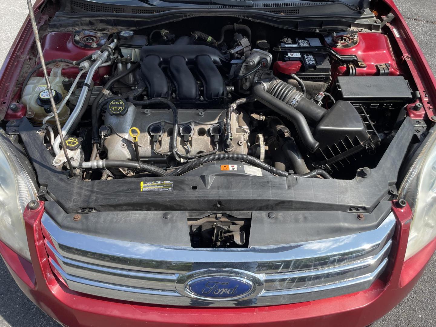 2008 burgandy /tan Ford Fusion V6 SE AWD (3FAHP01138R) with an 3.0L V6 DOHC 24V engine, located at 101 N. Main Street, Muncy, PA, 17756, (570) 546-5462, 41.207691, -76.785942 - Photo#7