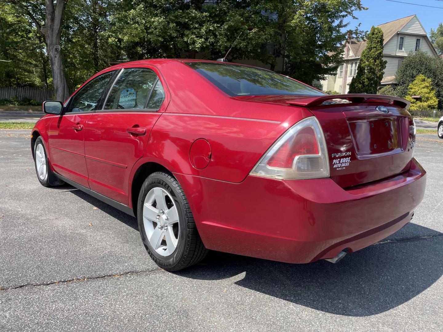 2008 burgandy /tan Ford Fusion V6 SE AWD (3FAHP01138R) with an 3.0L V6 DOHC 24V engine, located at 101 N. Main Street, Muncy, PA, 17756, (570) 546-5462, 41.207691, -76.785942 - Photo#2