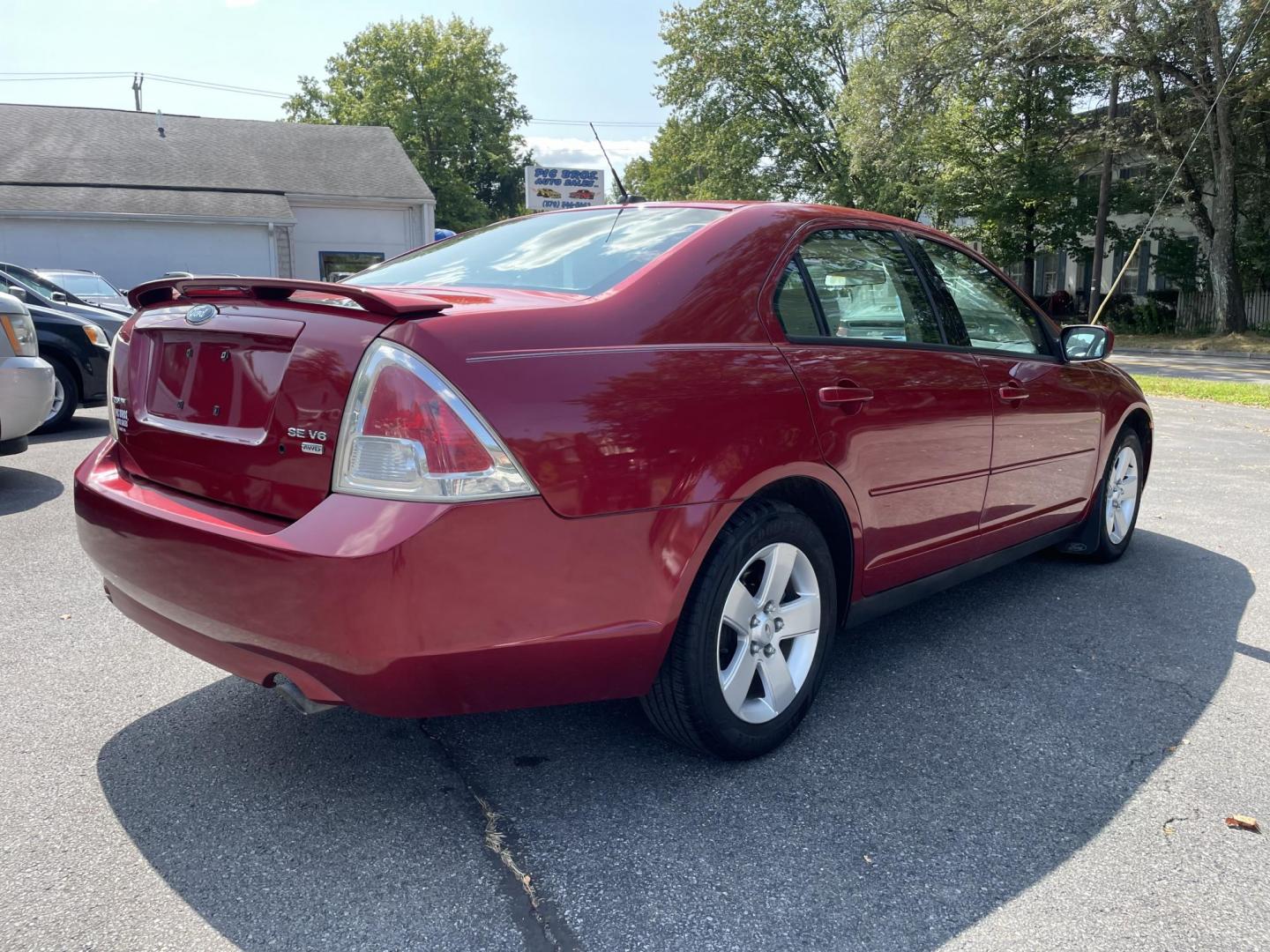 2008 burgandy /tan Ford Fusion V6 SE AWD (3FAHP01138R) with an 3.0L V6 DOHC 24V engine, located at 101 N. Main Street, Muncy, PA, 17756, (570) 546-5462, 41.207691, -76.785942 - Photo#3