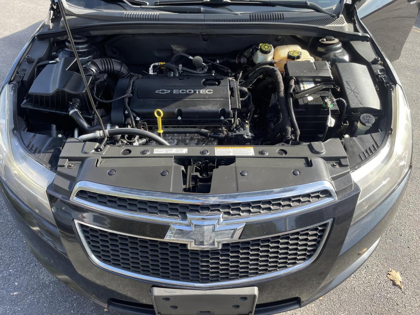 2014 black Chevrolet Cruze LS Auto (1G1PA5SG0E7) with an 1.8L L4 DOHC 16V engine, 6-Speed Automatic transmission, located at 101 N. Main Street, Muncy, PA, 17756, (570) 546-5462, 41.207691, -76.785942 - Photo#7