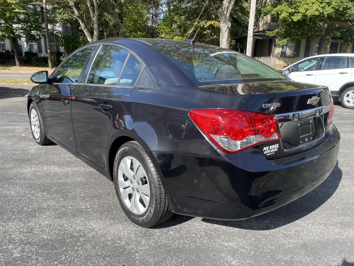 2014 black Chevrolet Cruze LS Auto (1G1PA5SG0E7) with an 1.8L L4 DOHC 16V engine, 6-Speed Automatic transmission, located at 101 N. Main Street, Muncy, PA, 17756, (570) 546-5462, 41.207691, -76.785942 - Photo#3