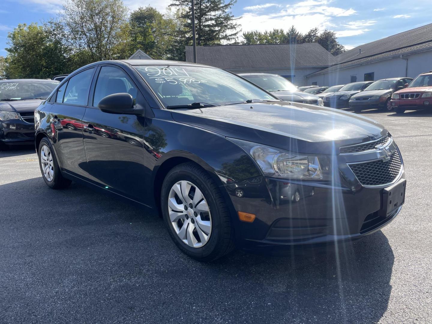 2014 black Chevrolet Cruze LS Auto (1G1PA5SG0E7) with an 1.8L L4 DOHC 16V engine, 6-Speed Automatic transmission, located at 101 N. Main Street, Muncy, PA, 17756, (570) 546-5462, 41.207691, -76.785942 - Photo#1