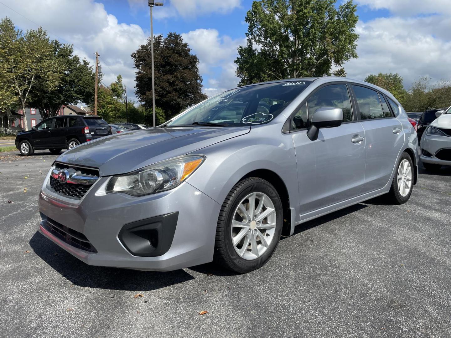 2014 silver Subaru Impreza 2.0i Premium 5-Door w/All Weather Package (JF1GPAC62E8) with an 2.0L H4 DOHC 16V engine, Continuously Variable Transmission transmission, located at 101 N. Main Street, Muncy, PA, 17756, (570) 546-5462, 41.207691, -76.785942 - Photo#0