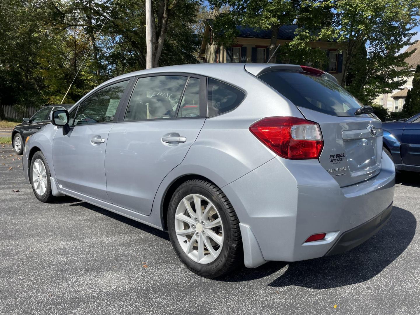 2014 silver Subaru Impreza 2.0i Premium 5-Door w/All Weather Package (JF1GPAC62E8) with an 2.0L H4 DOHC 16V engine, Continuously Variable Transmission transmission, located at 101 N. Main Street, Muncy, PA, 17756, (570) 546-5462, 41.207691, -76.785942 - Photo#2