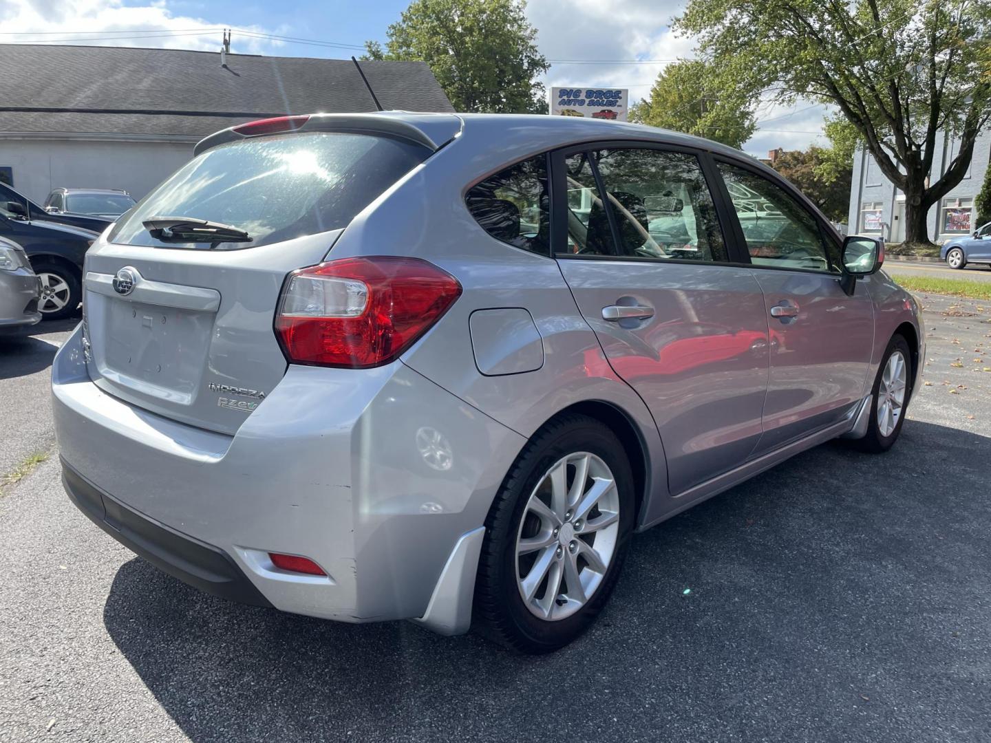 2014 silver Subaru Impreza 2.0i Premium 5-Door w/All Weather Package (JF1GPAC62E8) with an 2.0L H4 DOHC 16V engine, Continuously Variable Transmission transmission, located at 101 N. Main Street, Muncy, PA, 17756, (570) 546-5462, 41.207691, -76.785942 - Photo#3