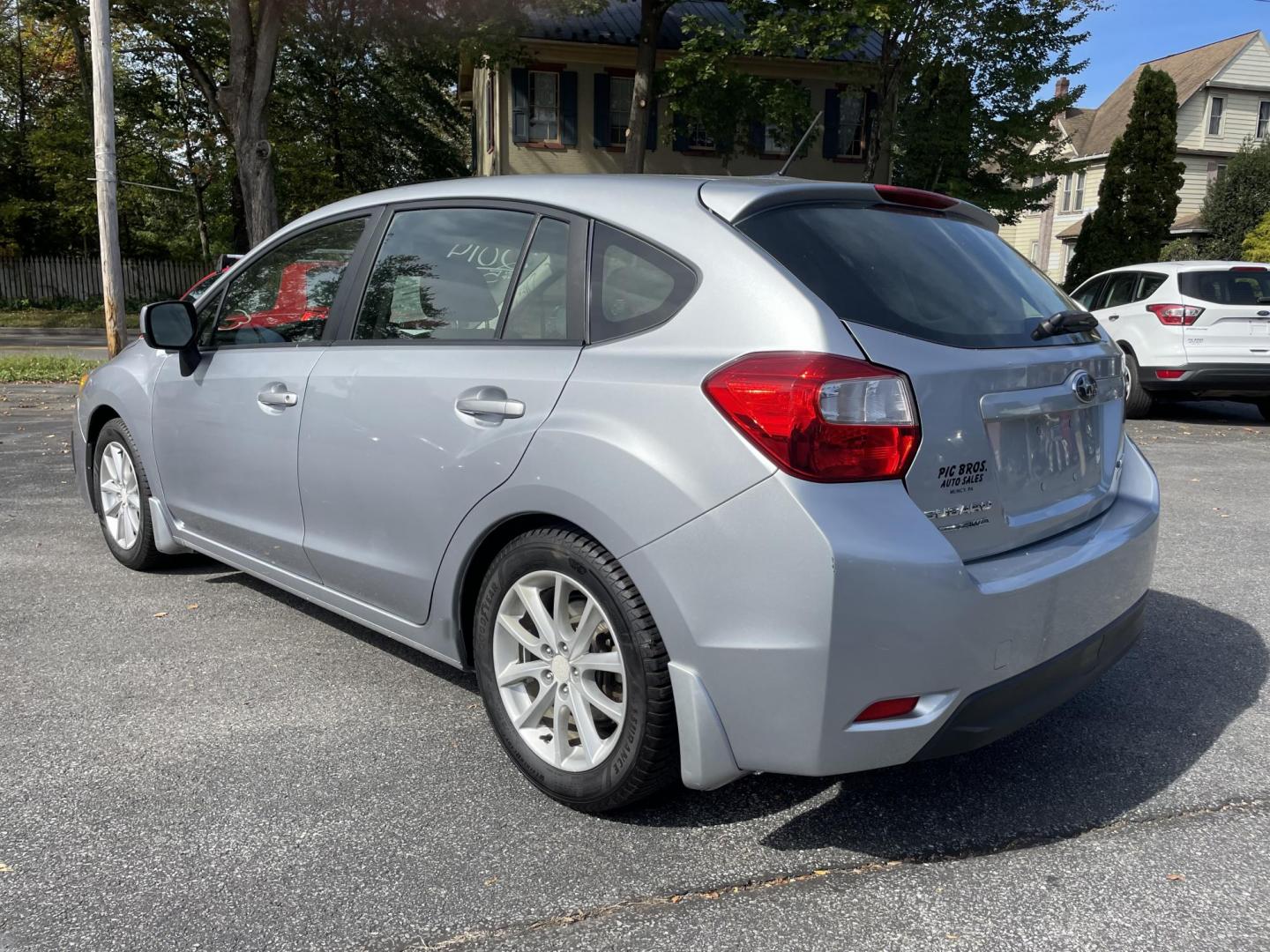 2014 silver Subaru Impreza 2.0i Premium 5-Door w/All Weather Package (JF1GPAC62E8) with an 2.0L H4 DOHC 16V engine, Continuously Variable Transmission transmission, located at 101 N. Main Street, Muncy, PA, 17756, (570) 546-5462, 41.207691, -76.785942 - Photo#3
