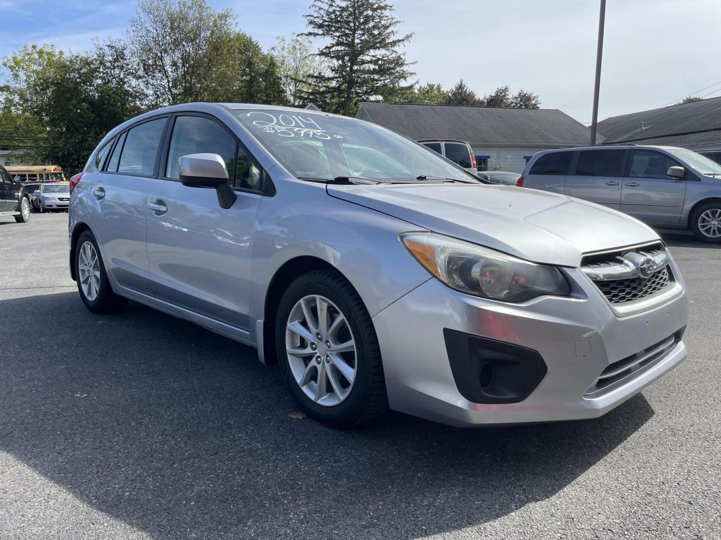 2014 silver Subaru Impreza 2.0i Premium 5-Door w/All Weather Package (JF1GPAC62E8) with an 2.0L H4 DOHC 16V engine, Continuously Variable Transmission transmission, located at 101 N. Main Street, Muncy, PA, 17756, (570) 546-5462, 41.207691, -76.785942 - Photo#1