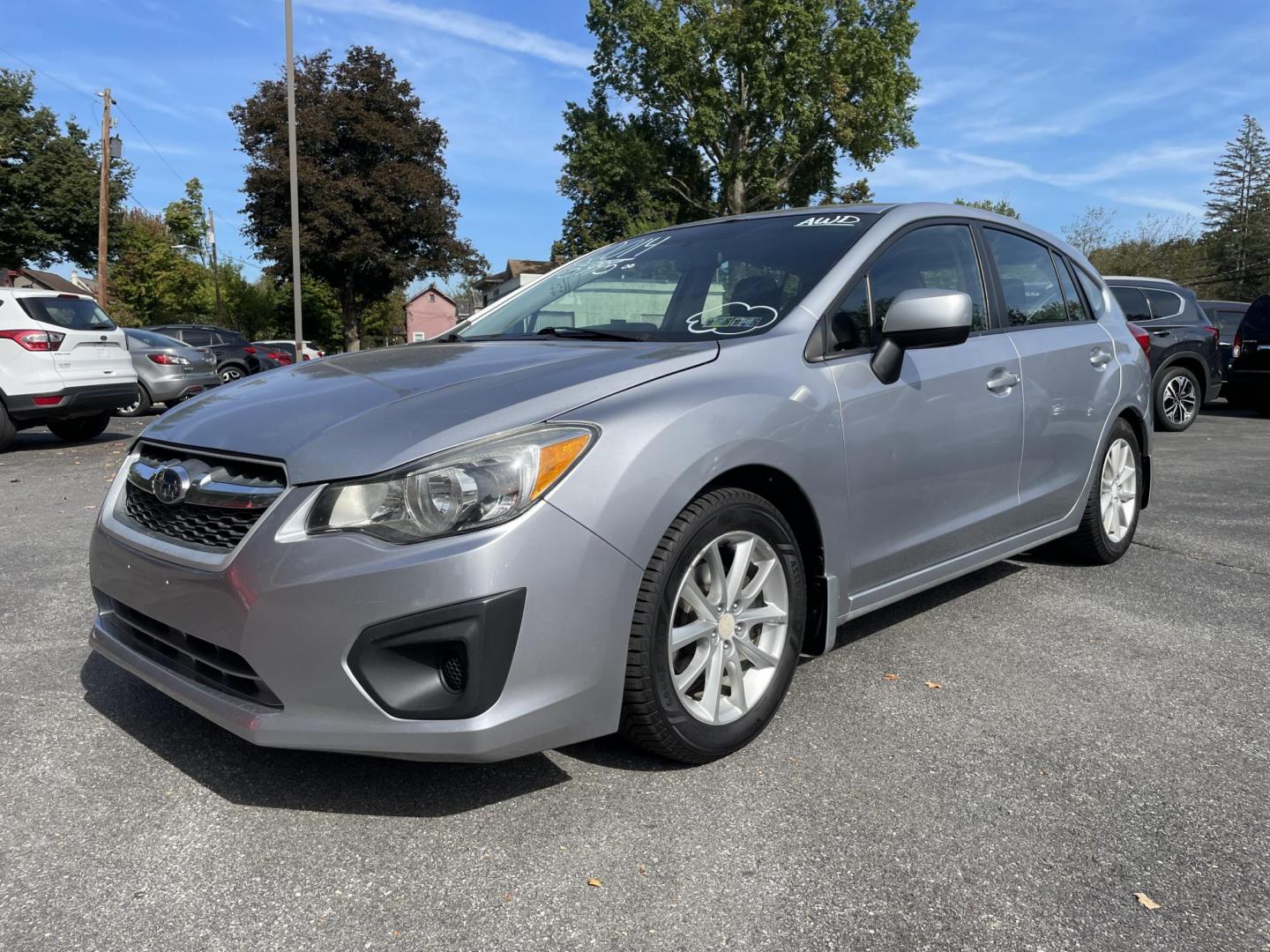 2014 silver Subaru Impreza 2.0i Premium 5-Door w/All Weather Package (JF1GPAC62E8) with an 2.0L H4 DOHC 16V engine, Continuously Variable Transmission transmission, located at 101 N. Main Street, Muncy, PA, 17756, (570) 546-5462, 41.207691, -76.785942 - Photo#0
