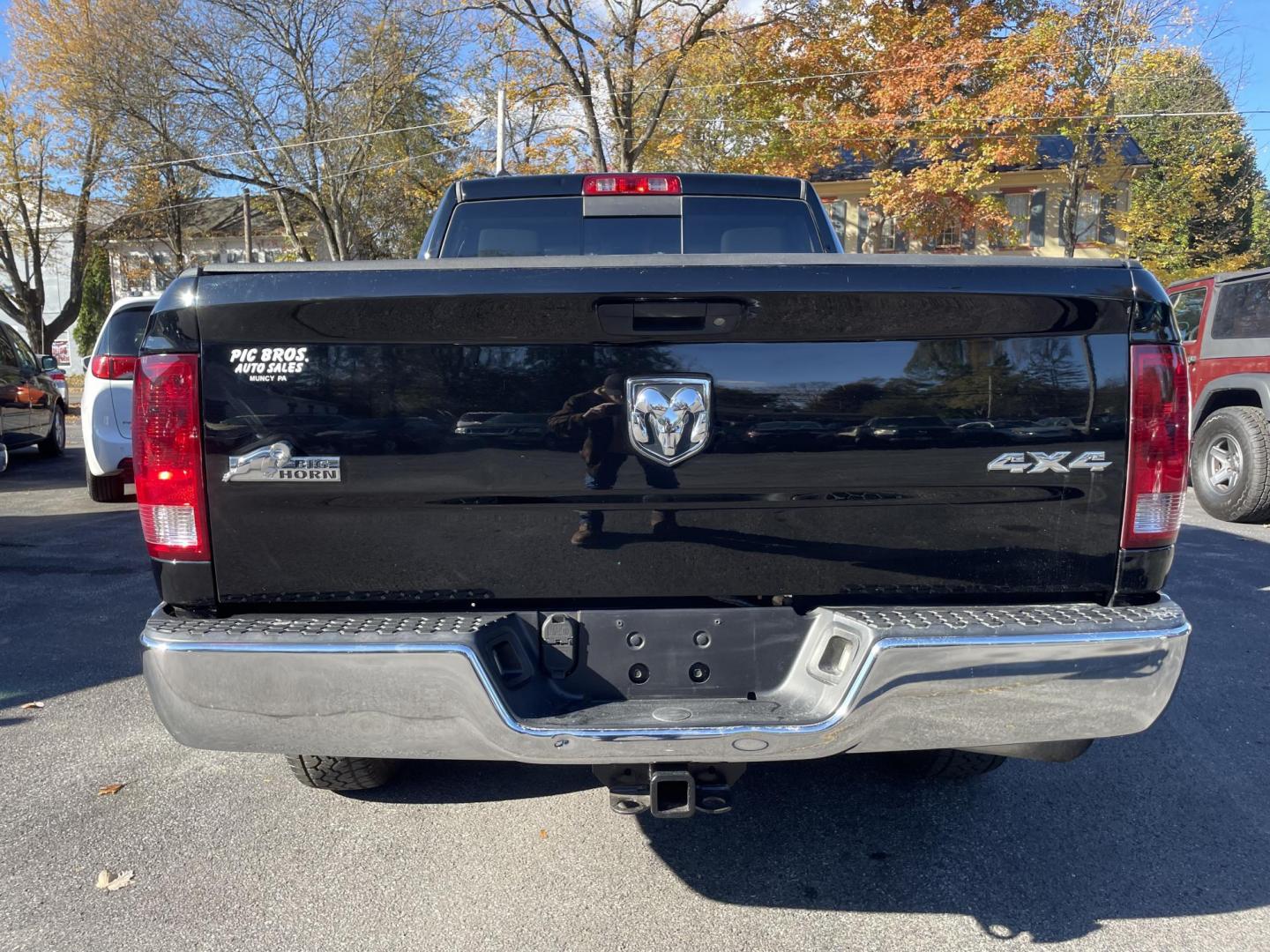 2013 black RAM 1500 SLT Quad Cab 4WD (1C6RR7GG8DS) with an 3.6L V6 DOHC 24V FFV engine, 6-Speed Automatic transmission, located at 101 N. Main Street, Muncy, PA, 17756, (570) 546-5462, 41.207691, -76.785942 - Photo#5