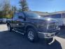 2013 black RAM 1500 SLT Quad Cab 4WD (1C6RR7GG8DS) with an 3.6L V6 DOHC 24V FFV engine, 6-Speed Automatic transmission, located at 101 N. Main Street, Muncy, PA, 17756, (570) 546-5462, 41.207691, -76.785942 - Photo#1