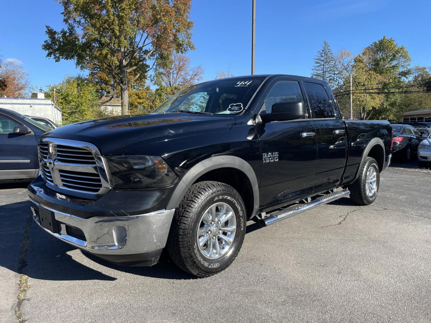 2013 black RAM 1500 SLT Quad Cab 4WD (1C6RR7GG8DS) with an 3.6L V6 DOHC 24V FFV engine, 6-Speed Automatic transmission, located at 101 N. Main Street, Muncy, PA, 17756, (570) 546-5462, 41.207691, -76.785942 - Photo#0