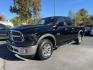 2013 black RAM 1500 SLT Quad Cab 4WD (1C6RR7GG8DS) with an 3.6L V6 DOHC 24V FFV engine, 6-Speed Automatic transmission, located at 101 N. Main Street, Muncy, PA, 17756, (570) 546-5462, 41.207691, -76.785942 - Photo#0