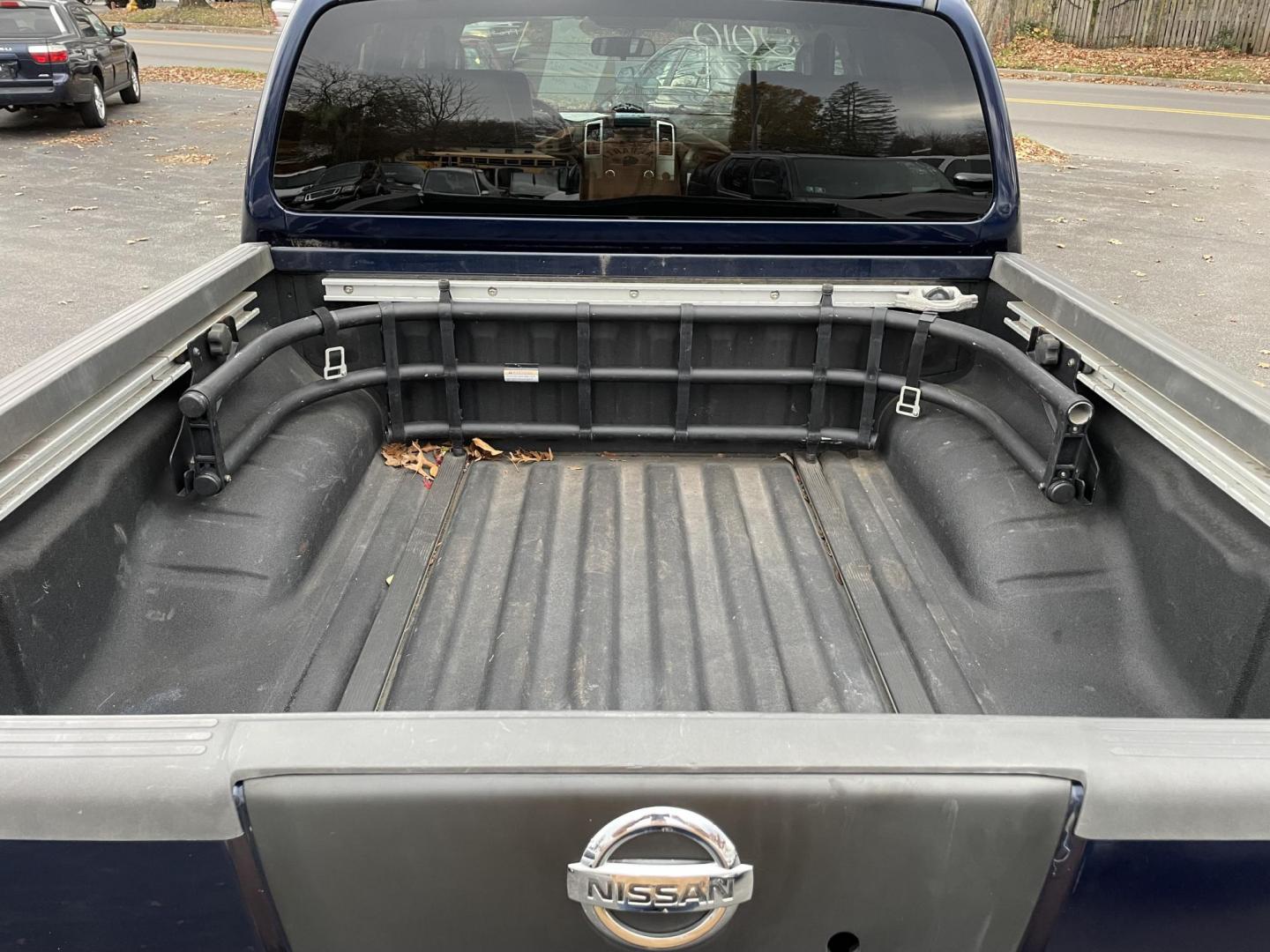 2010 BLUE /black Nissan Frontier LE Crew Cab 4WD (1N6AD0EV0AC) with an 4.0L V6 DOHC 24V engine, 5-Speed Automatic transmission, located at 101 N. Main Street, Muncy, PA, 17756, (570) 546-5462, 41.207691, -76.785942 - Photo#6