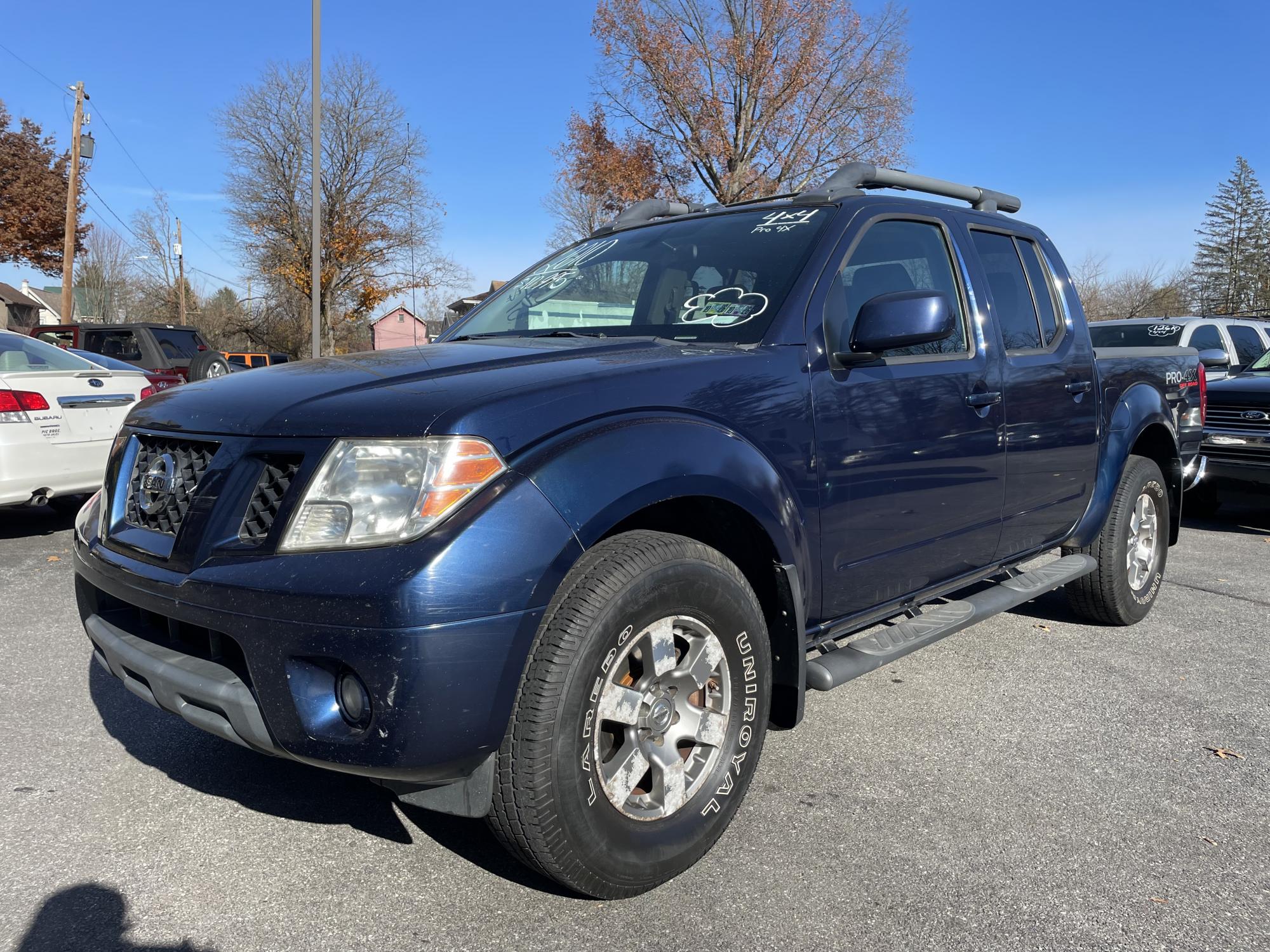 photo of 2010 Nissan Frontier LE Crew Cab 4WD