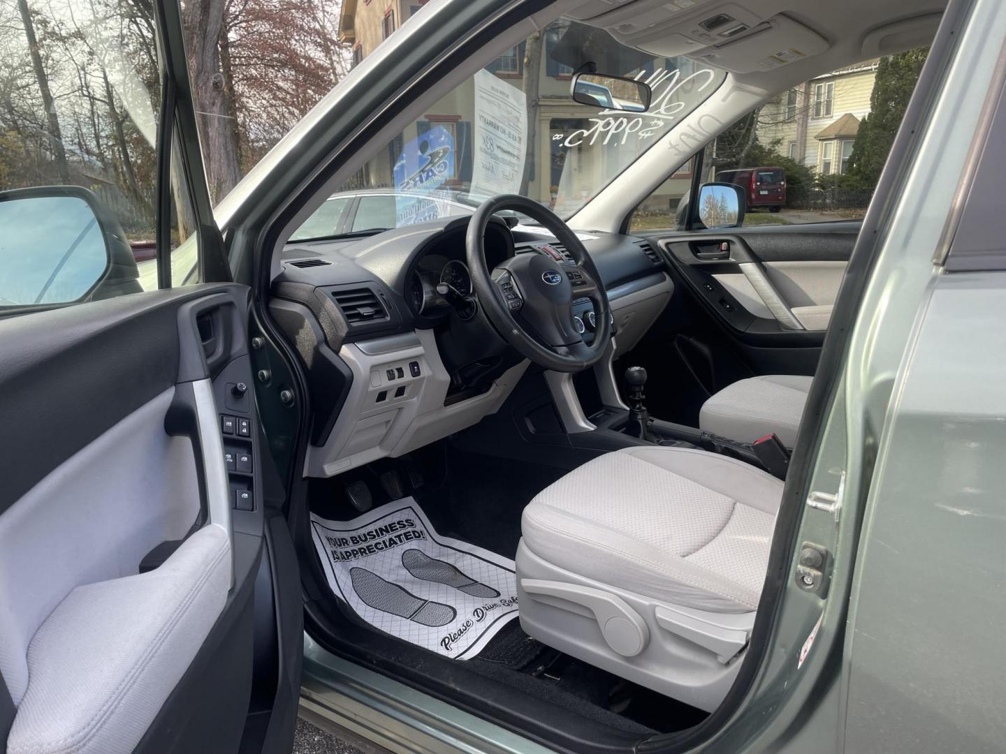 2014 Subaru Forester 2.5i (JF2SJAAC6EG) with an 2.5L H4 SOHC 16V engine, 6-Speed Manual transmission, located at 101 N. Main Street, Muncy, PA, 17756, (570) 546-5462, 41.207691, -76.785942 - Photo#7