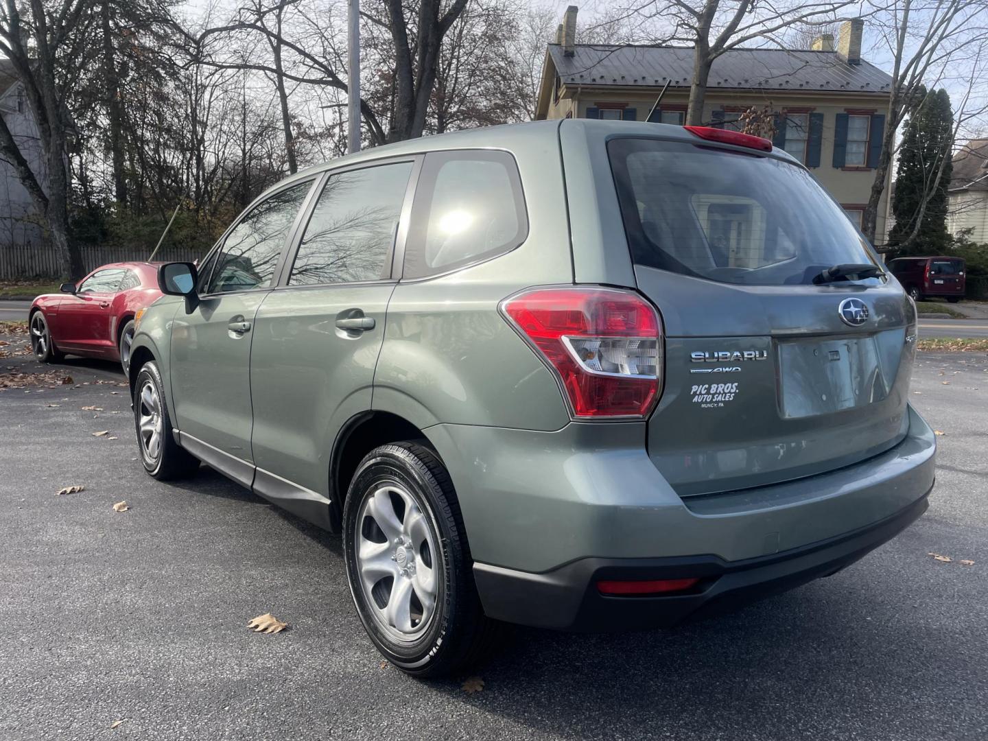2014 Subaru Forester 2.5i (JF2SJAAC6EG) with an 2.5L H4 SOHC 16V engine, 6-Speed Manual transmission, located at 101 N. Main Street, Muncy, PA, 17756, (570) 546-5462, 41.207691, -76.785942 - Photo#1