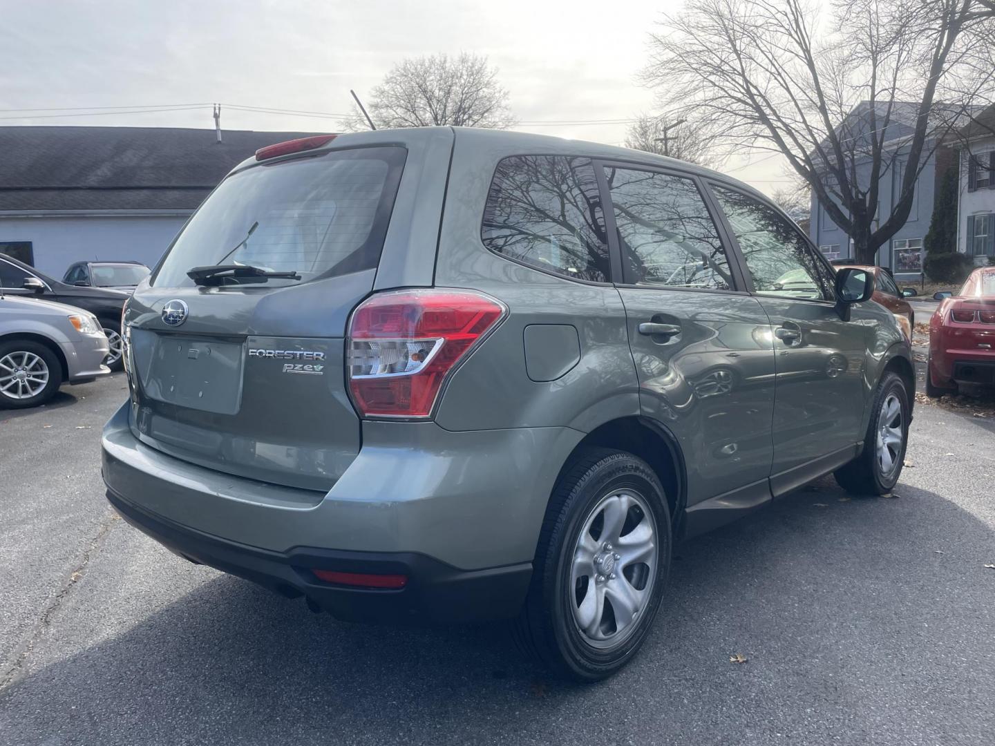 2014 Subaru Forester 2.5i (JF2SJAAC6EG) with an 2.5L H4 SOHC 16V engine, 6-Speed Manual transmission, located at 101 N. Main Street, Muncy, PA, 17756, (570) 546-5462, 41.207691, -76.785942 - Photo#5