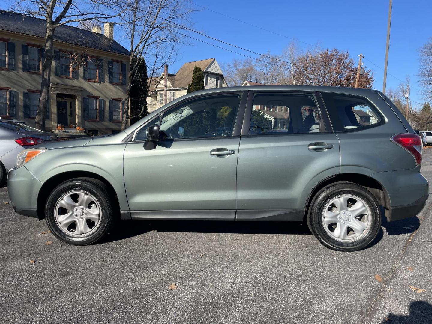 2014 Subaru Forester 2.5i (JF2SJAAC6EG) with an 2.5L H4 SOHC 16V engine, 6-Speed Manual transmission, located at 101 N. Main Street, Muncy, PA, 17756, (570) 546-5462, 41.207691, -76.785942 - Photo#3