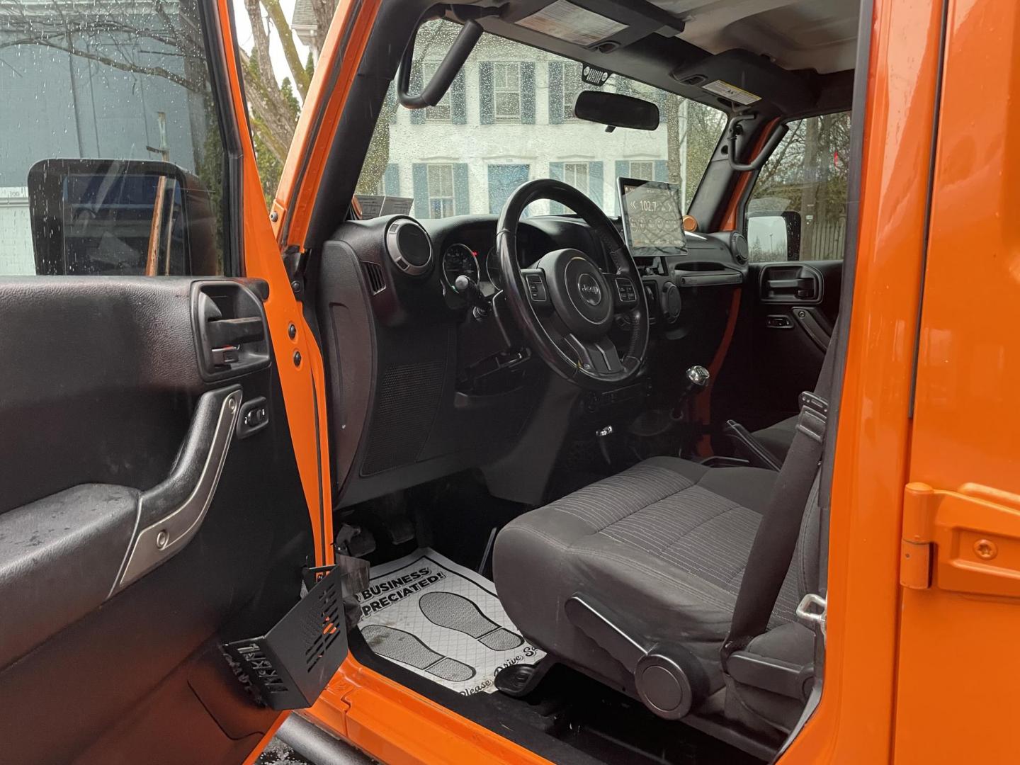 2012 Jeep Wrangler Unlimited Sport 4WD (1C4BJWDG2CL) with an 3.6L V6 DOHC 24V FFV engine, located at 101 N. Main Street, Muncy, PA, 17756, (570) 546-5462, 41.207691, -76.785942 - Photo#7